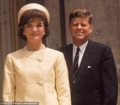 11134266-6821721-Mrs_Kennedy_in_a_yellow_pillbox_hat_and_matching_coat_as_she_joi-a-51_1552912...jpg