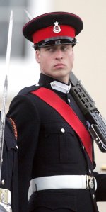 91691149-14393221-A_young_Prince_William_is_seen_wearing_a_blue_uniform_hat_and_wh-a-6_1740237...jpg