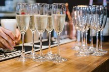 glasses-with-champagne-table-restaurant-preparation-celebrate_210435-4073.jpg