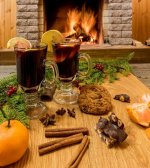 mulled-wine-glintwine-drinking-glasses-christmas-decorations-against-cozy-fireplace_73966-130.jpg