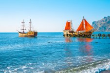 two-old-wooden-ships-one-them-red-sails-pier-two-old-wooden-ships-one-them-red-sails-pier-1346...jpg