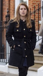54309097-10523069-The_royal_belted_her_Maje_coat_creating_a_stylish_cinched_in_loo-a-130_16450...jpg