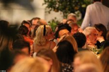 18697490-7484229-On_cloud_nine_The_pair_continued_to_exchange_kisses_at_the_dinne-a-140_156894...jpg