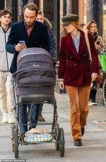 78207791-12788201-Kate_Middleton_s_brother_James_looked_to_be_taking_a_phone_call_-m-57_170085...jpg