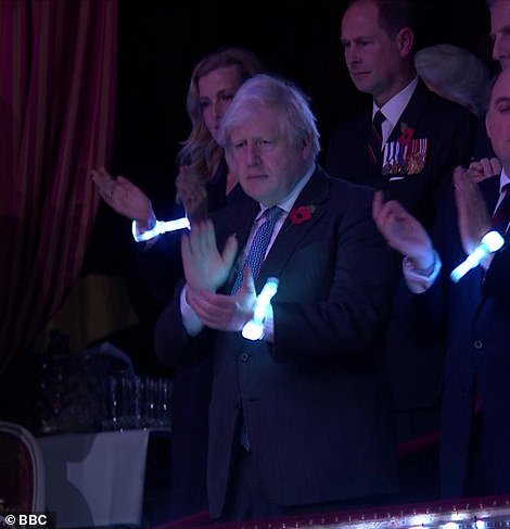 50448733-10198749-Prime_Minister_Boris_Johnson_also_joined_in_with_the_clapping-a-99_1636846387401.jpg